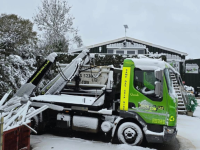 Throw & Tow Eco Skips Lorry Skip Hire in the snow