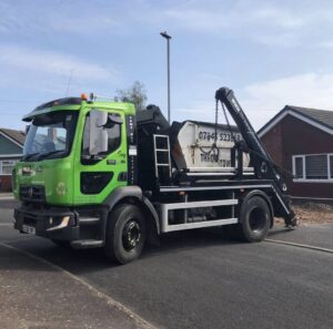 skip awaiting drop off at residential property